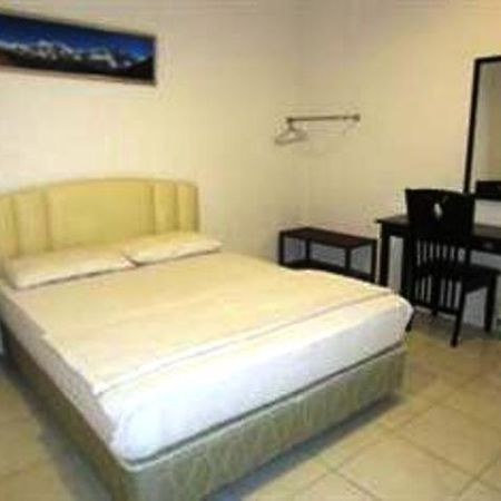 Mendu Inn Kuching Rum bild